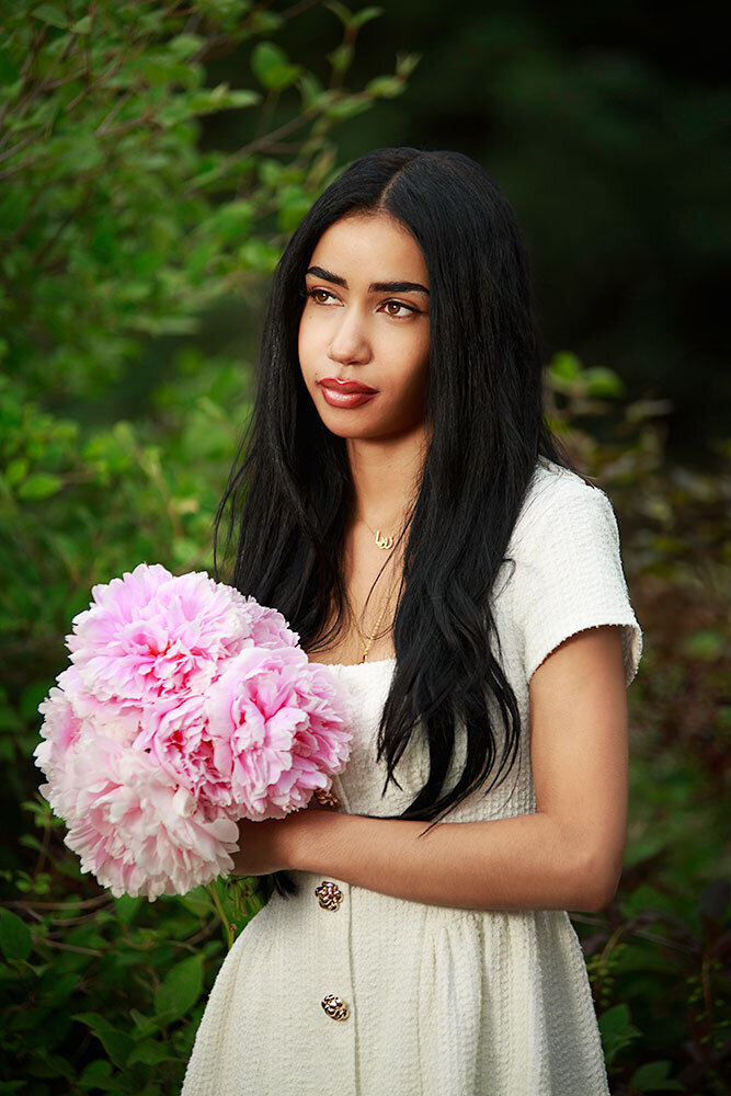 soulful-wise-senior-high-school-girl-quiet-african-american-indian-peonies-forest-green-background-lovely