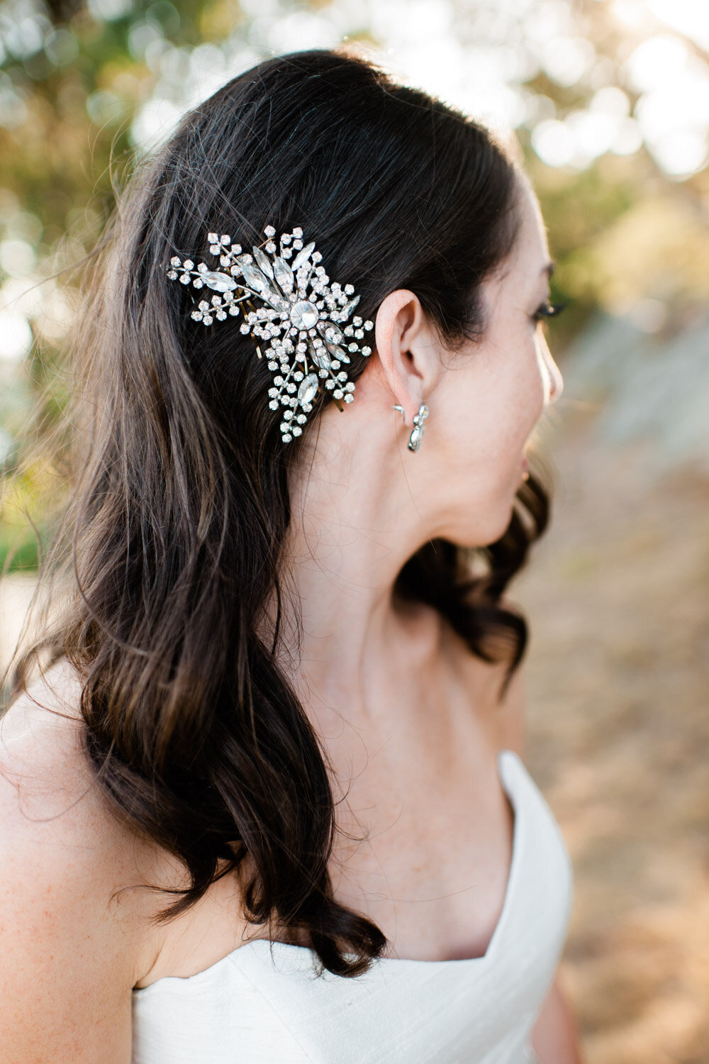 rhinestone hairpiece detail in hair