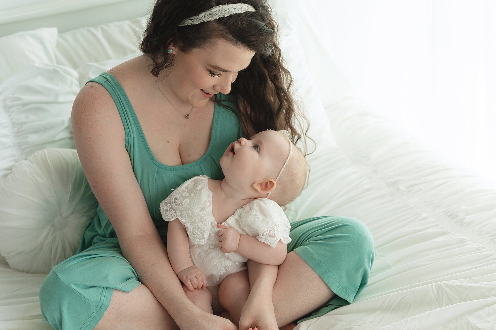 mom and little girl looking at each other