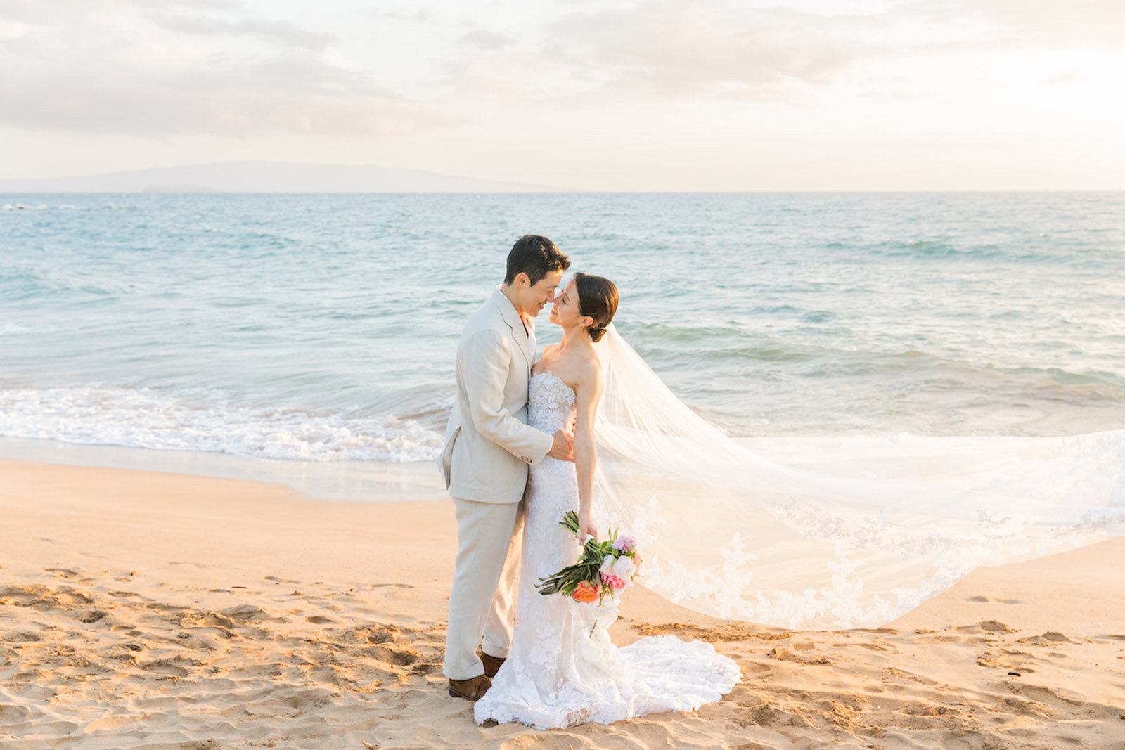 Hawaii wedding photography of bride and groom on the beach