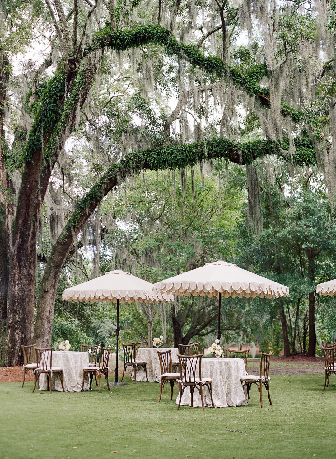 Wedding Cocktail Hour Tables with Umbrellas