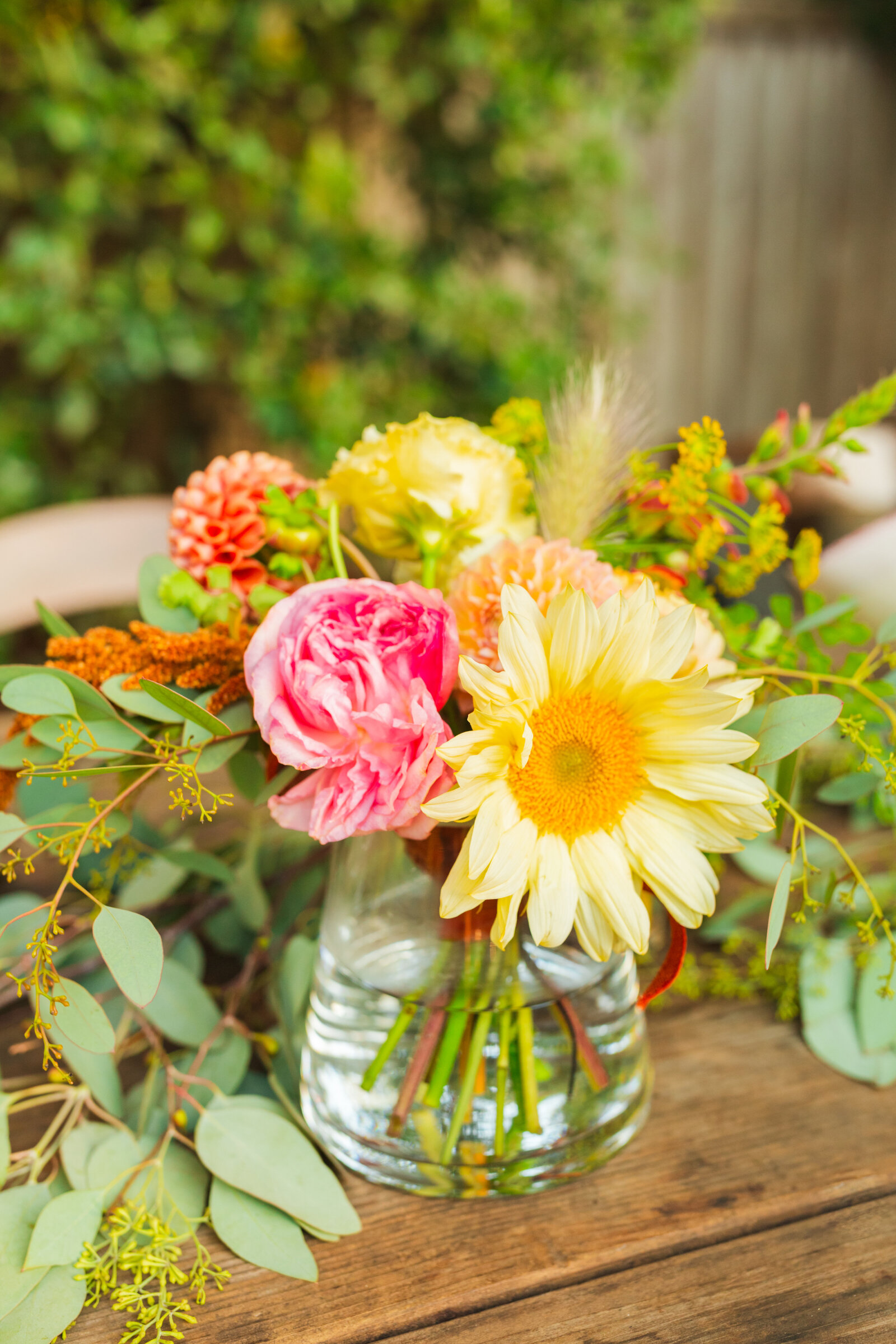 Colorful wedding flowers in Santa Cruz, California in the redwood trees.