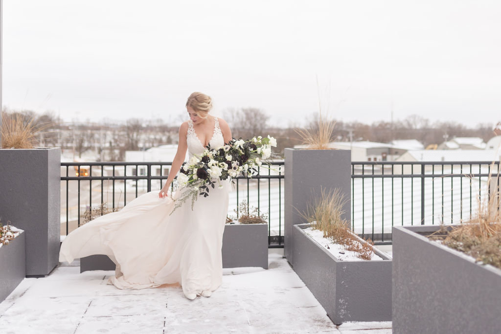 Bride on a winter rooftop