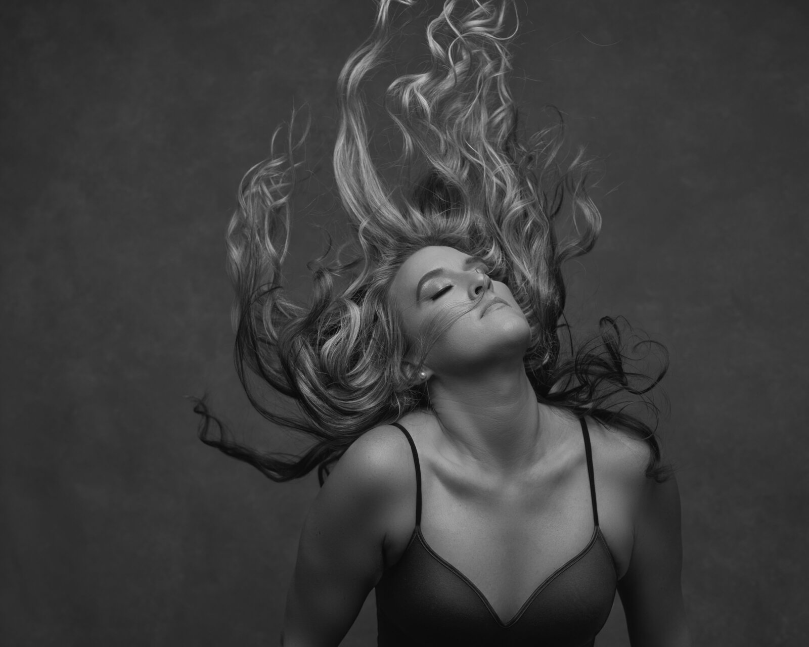 Creative portrait with hair flip