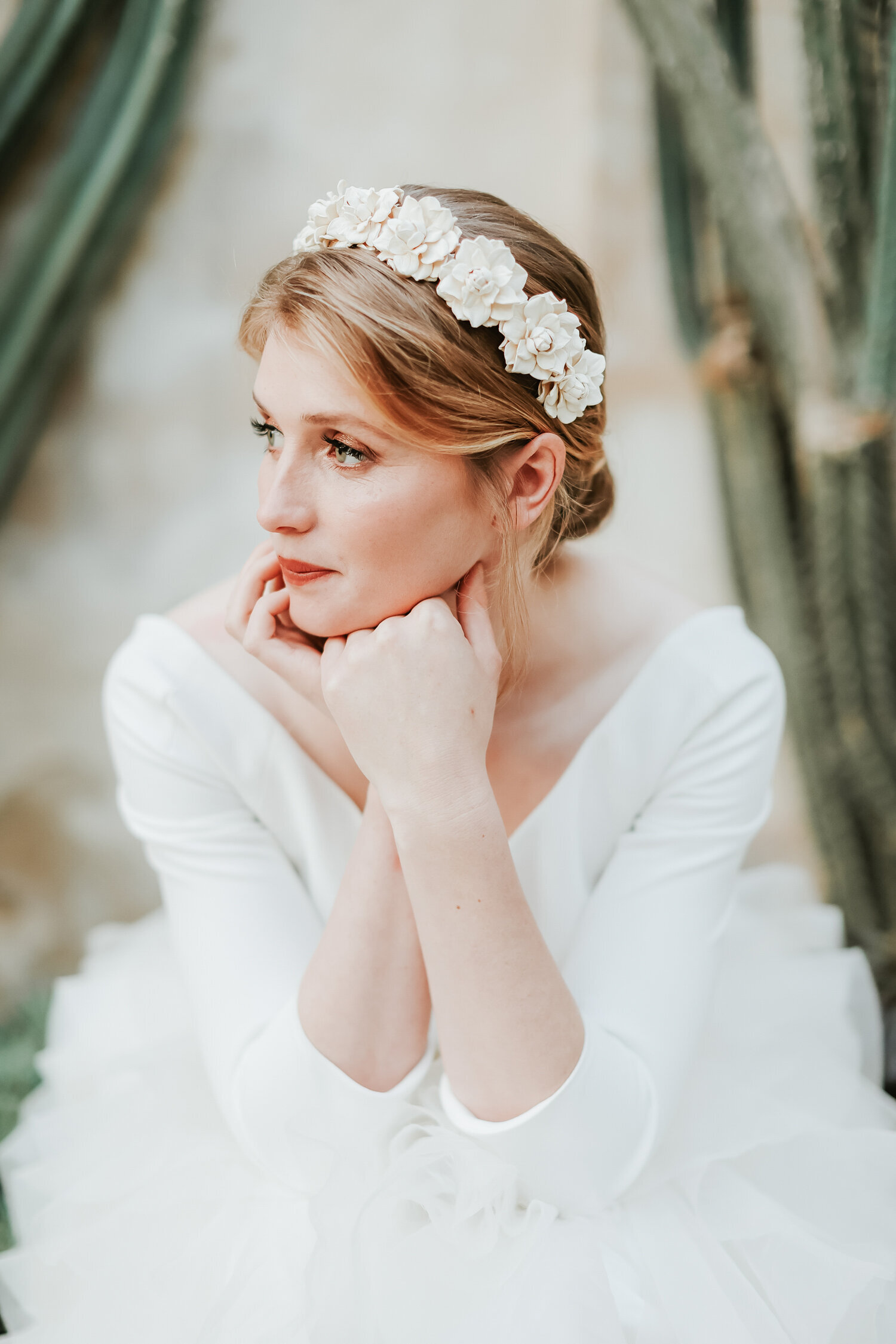 bride-sitting-with-pearl-headband
