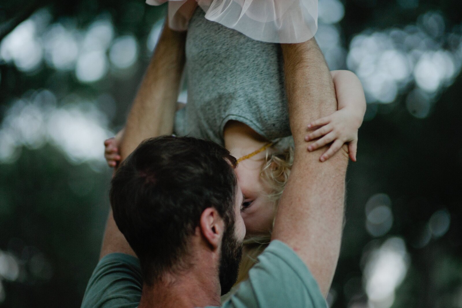 A sweet in-between moment from a natural Sydney family photography session
