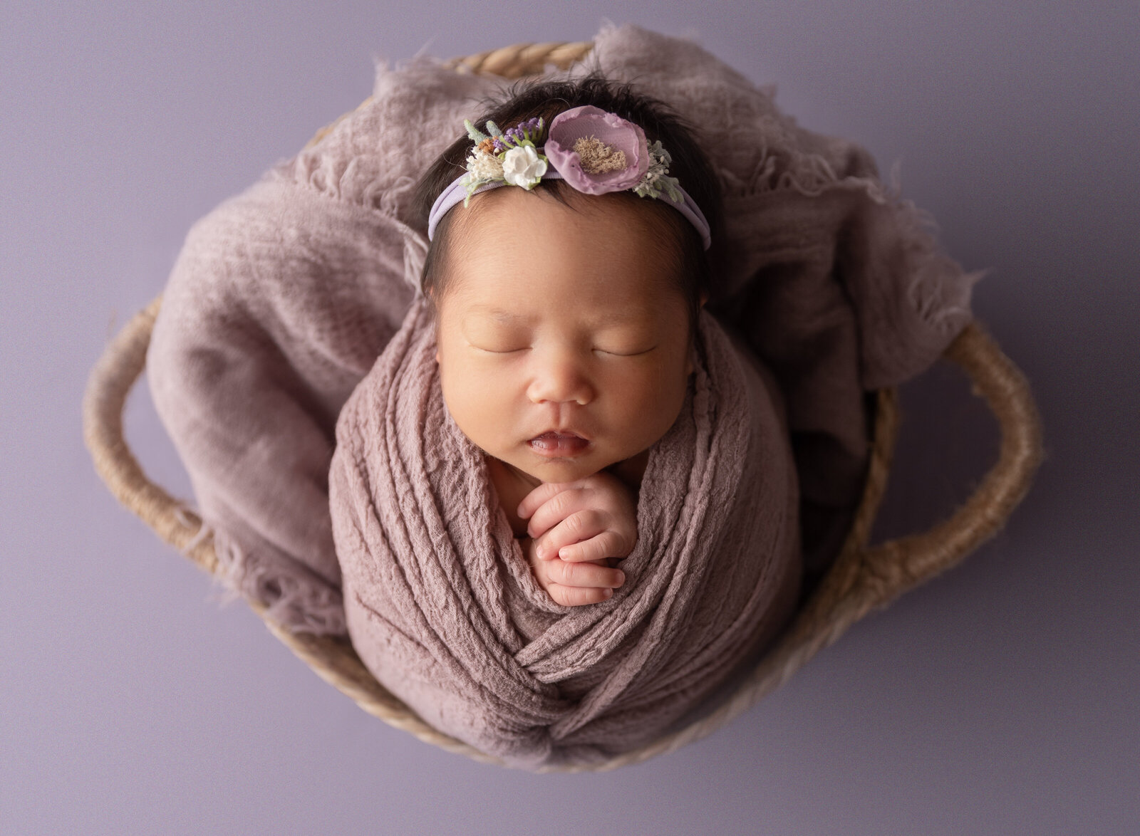 baby girl in purple
