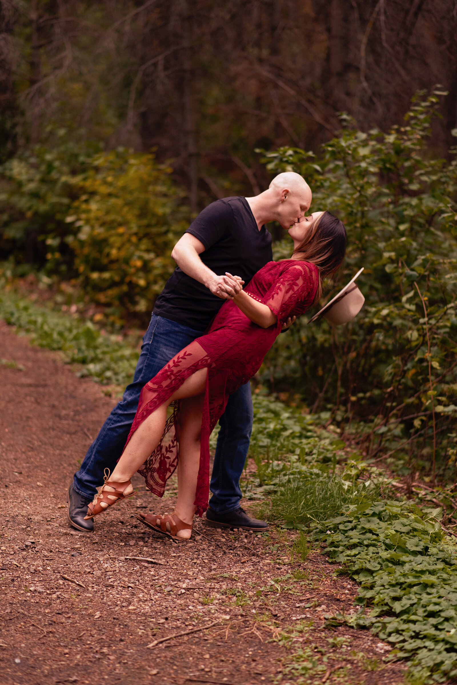 couple dancing in the woods