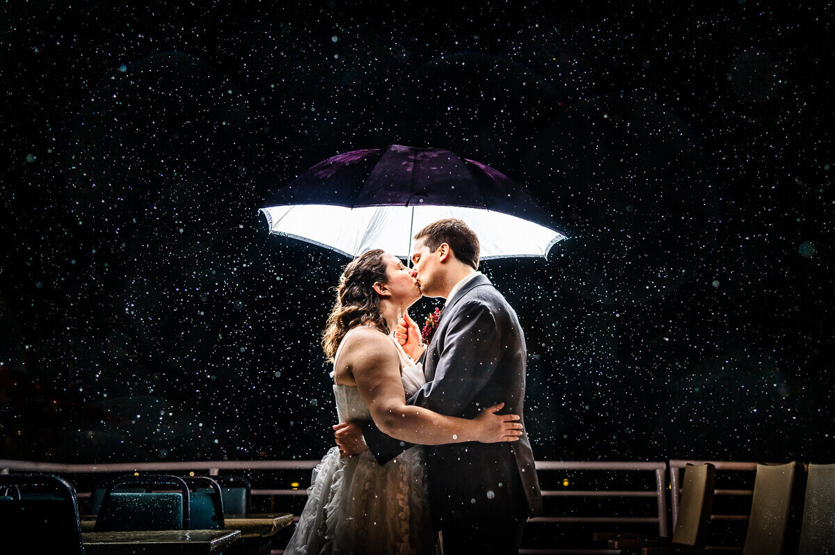 Backlit Rain Portrait With Umbrella