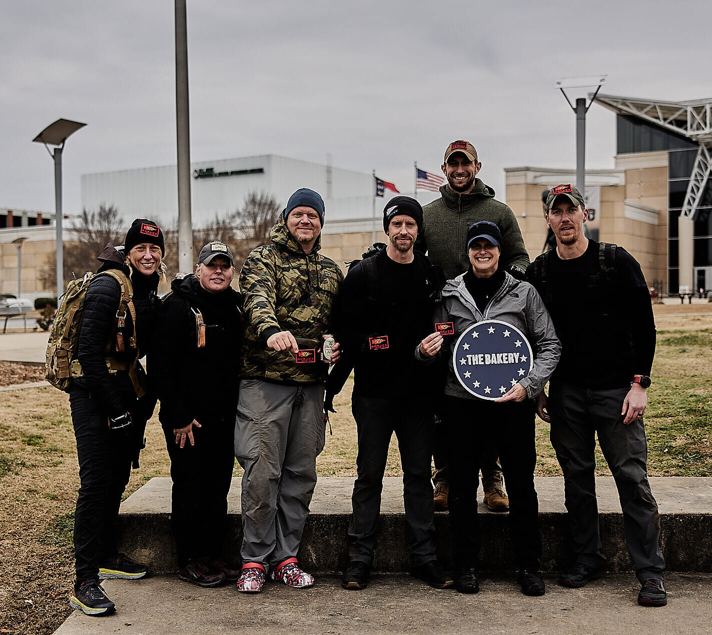The Bakery team celebrating after ruck training event, showcasing community and motivation.