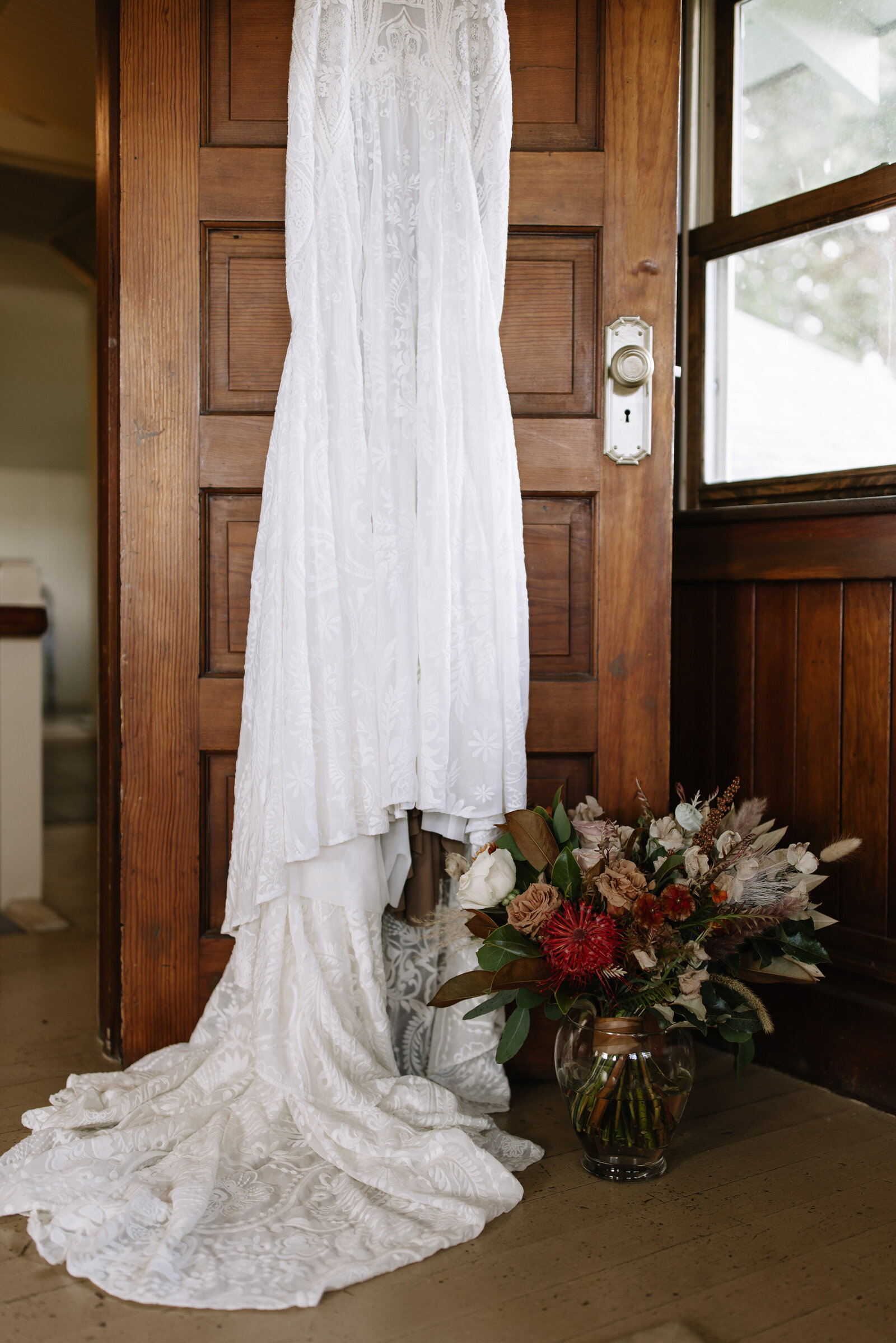 Detail photos of bride's dress and bouquet in Boise wedding bridal suite