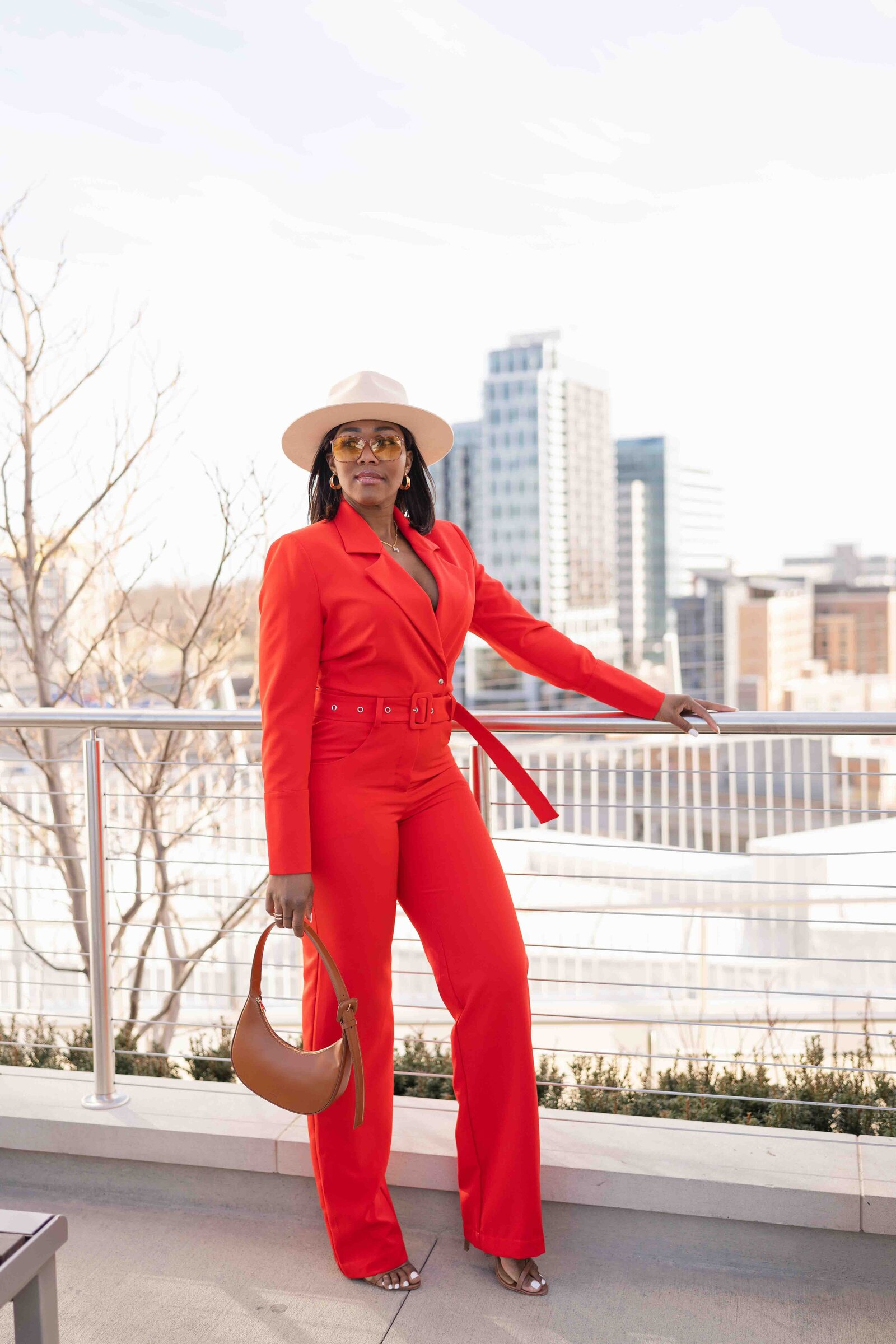 model standing on a location with city overview during ifestyle product picture in Haymarket,VA