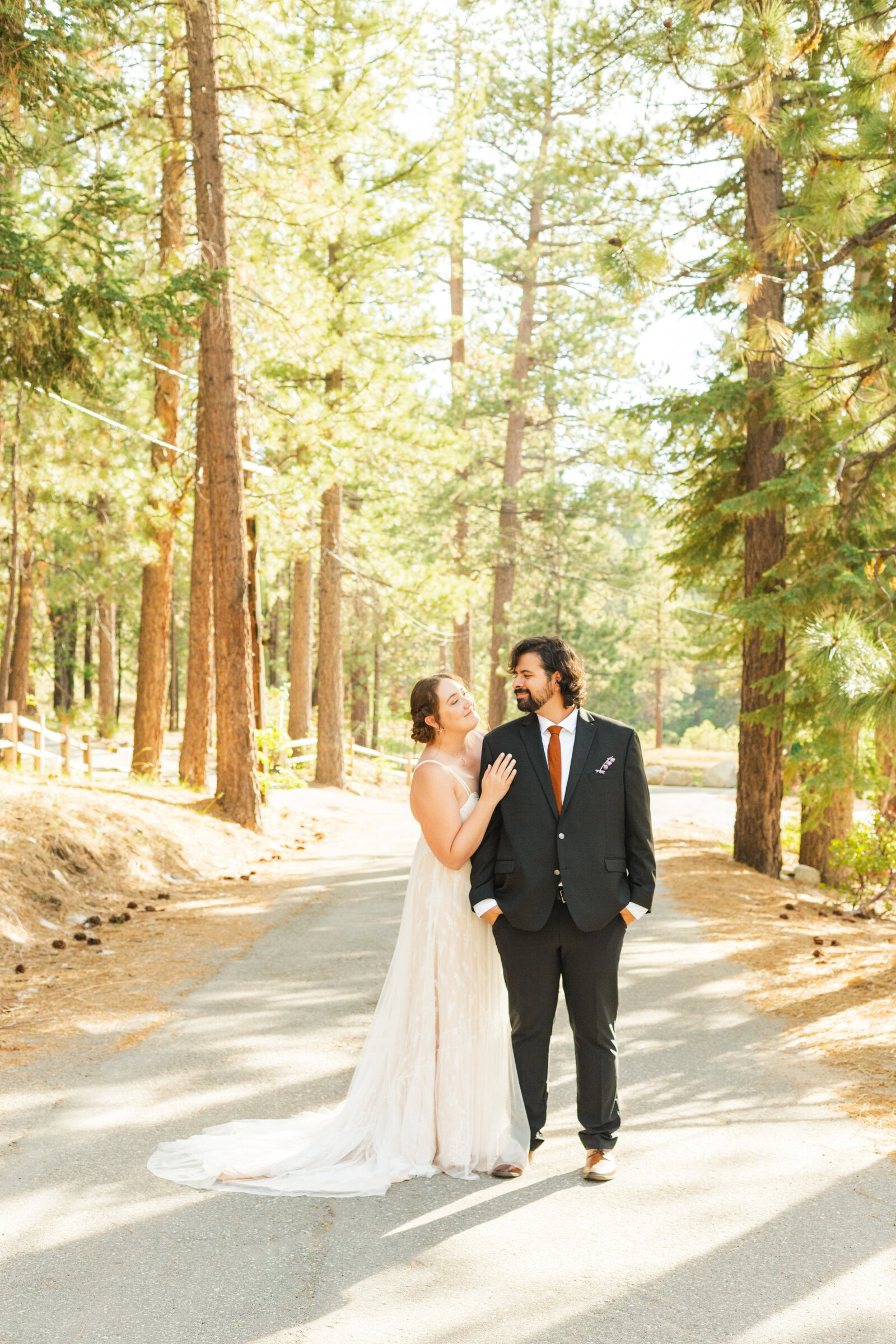 A couple celebrates their intimate elopement at a cabin at Big Bear Lake, California.
