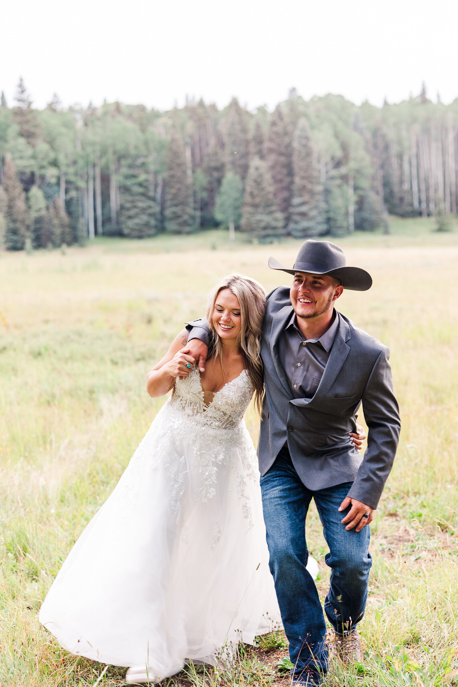 Groom pretends like he has had too much to drink and walks with his bride