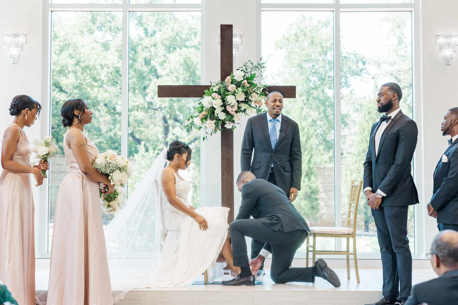 Groom washing bride's feet wedding ritual ceremony