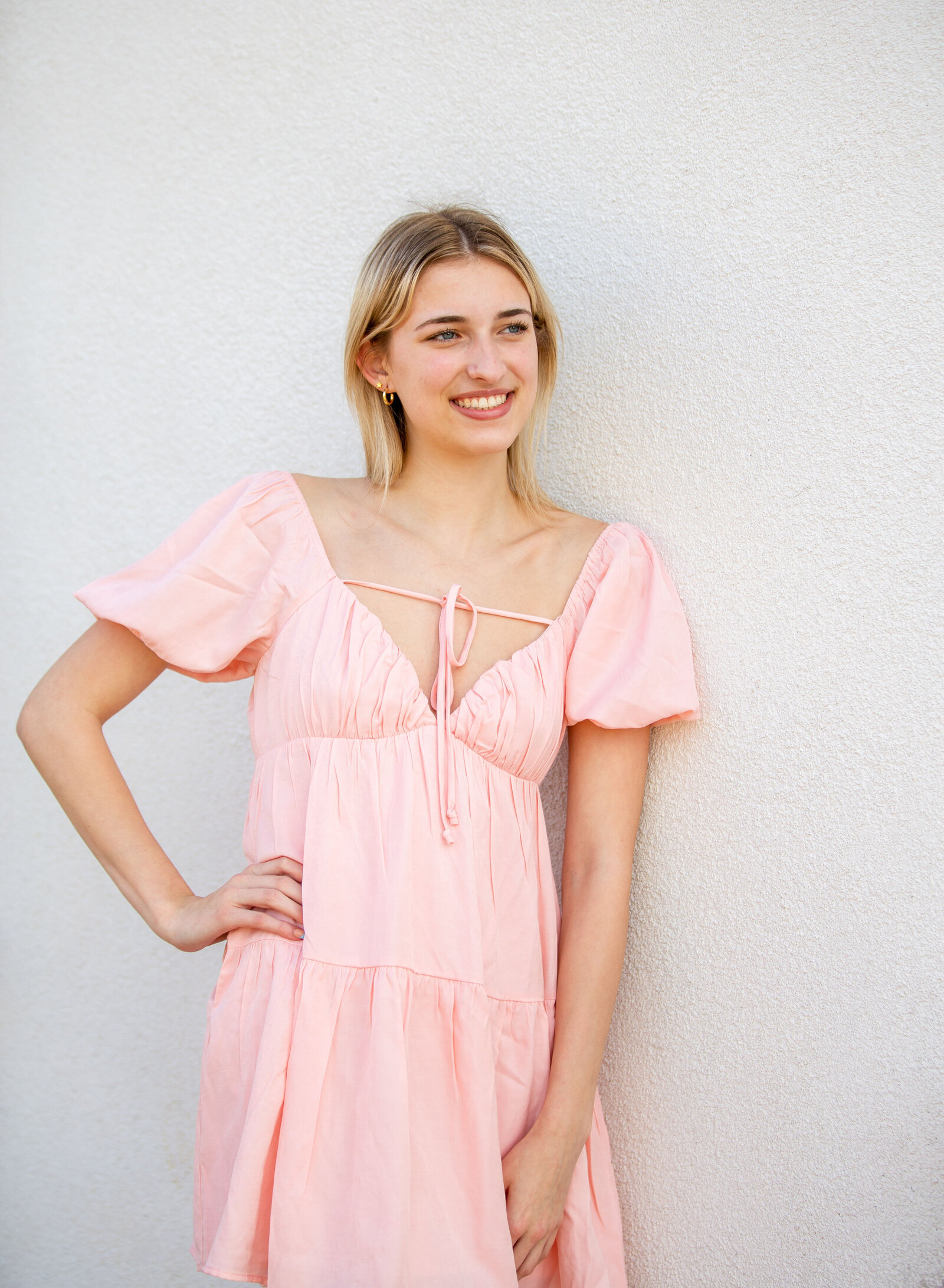 happy senior girl in pink dress