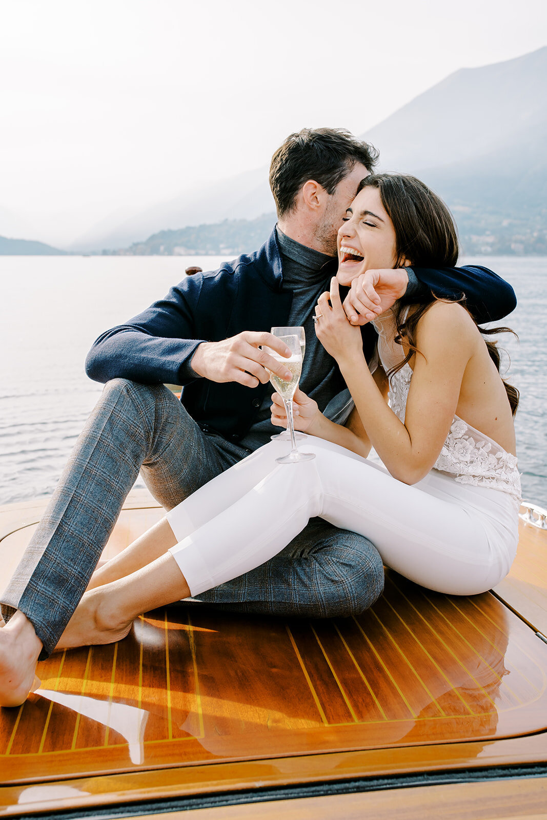 Boat engagement session on Lake Como Italy photographed by Lake Como wedding photographer Amy Mulder Photography