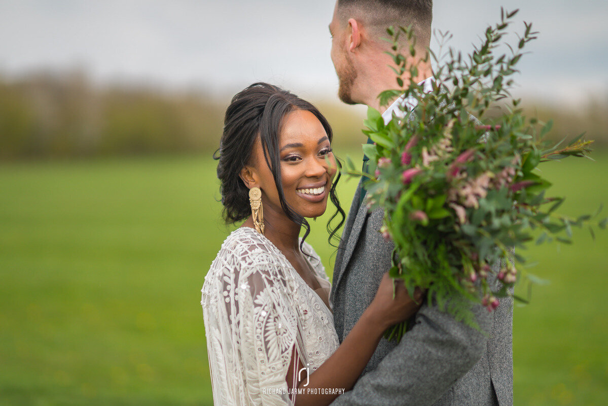 applewood hall afro bride and groom makeup hair updo