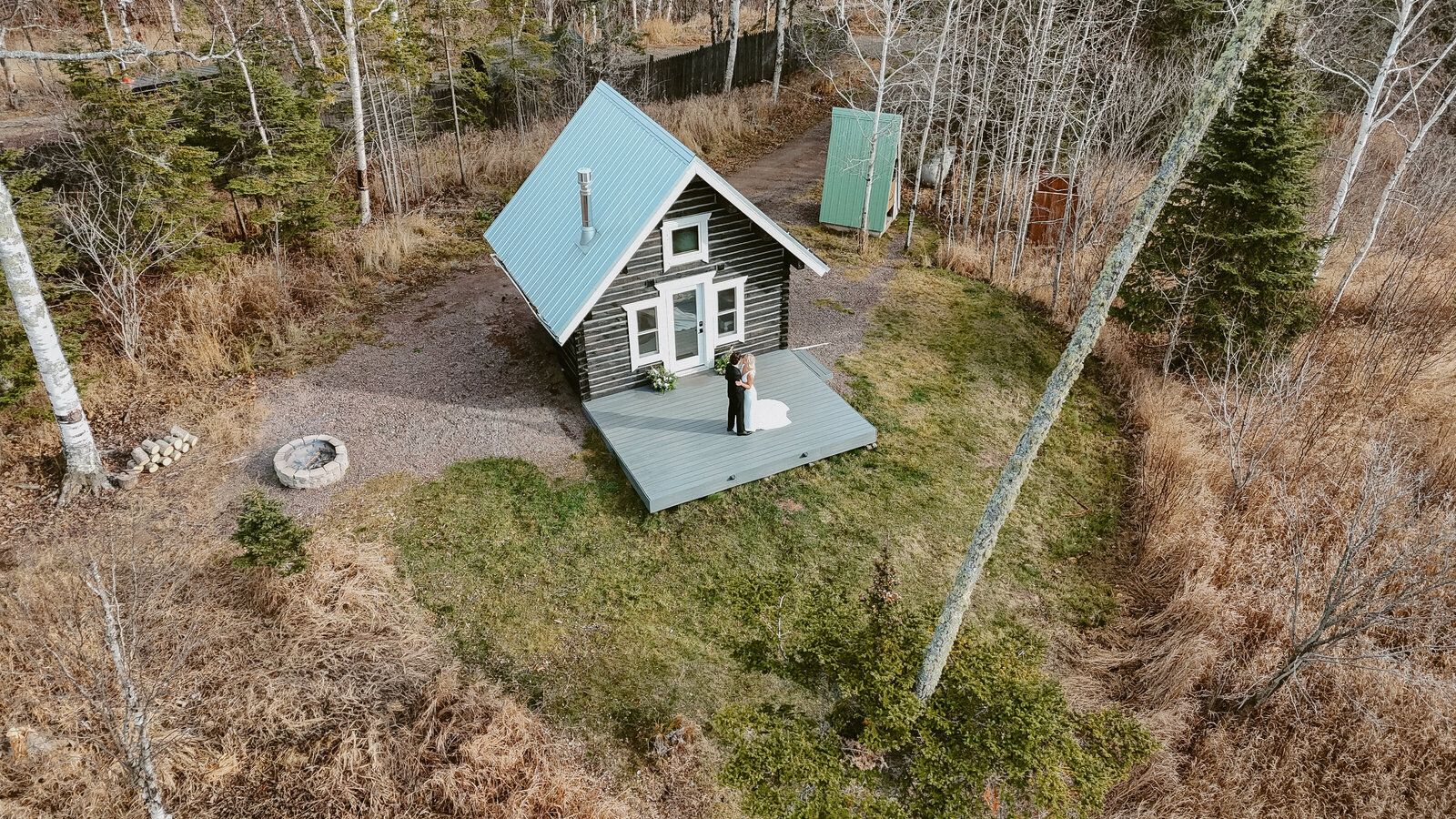 Couples stand by the cabin on North Shore Minnesota for their Elopement