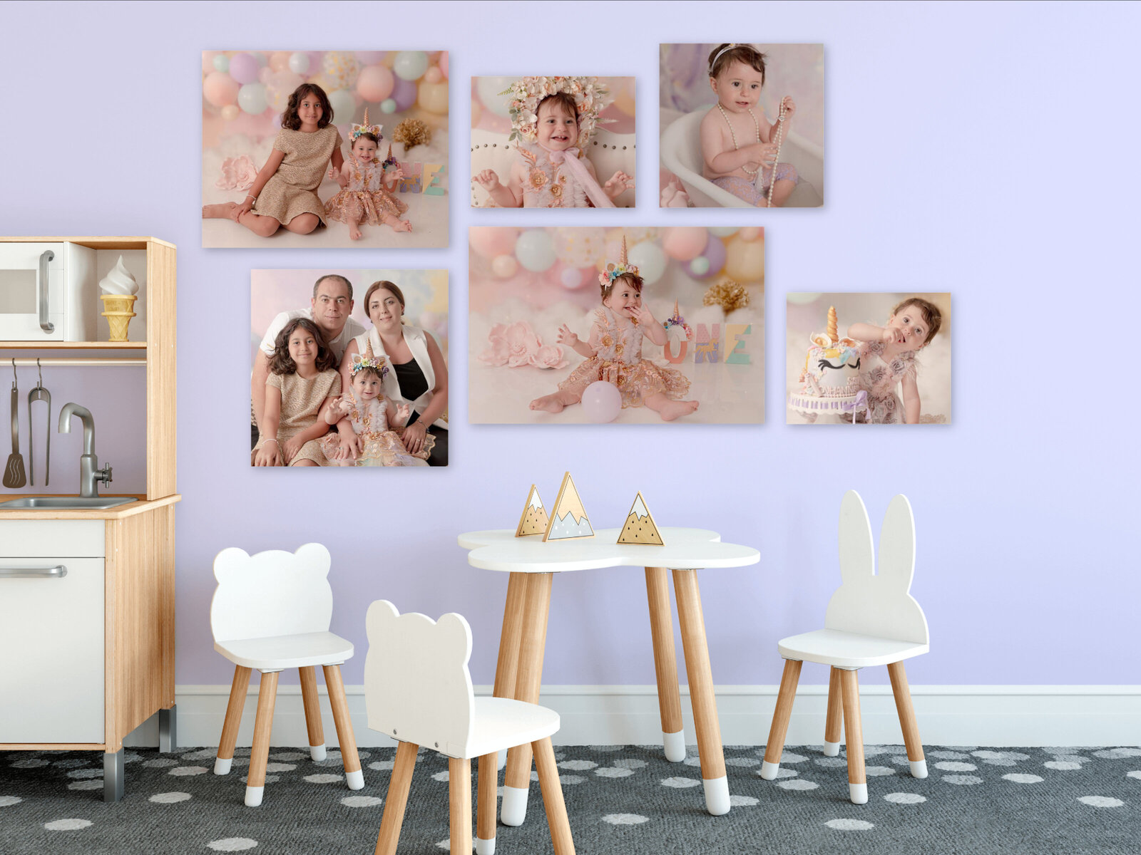 Baby portraits hanging on the wall in a client's home.