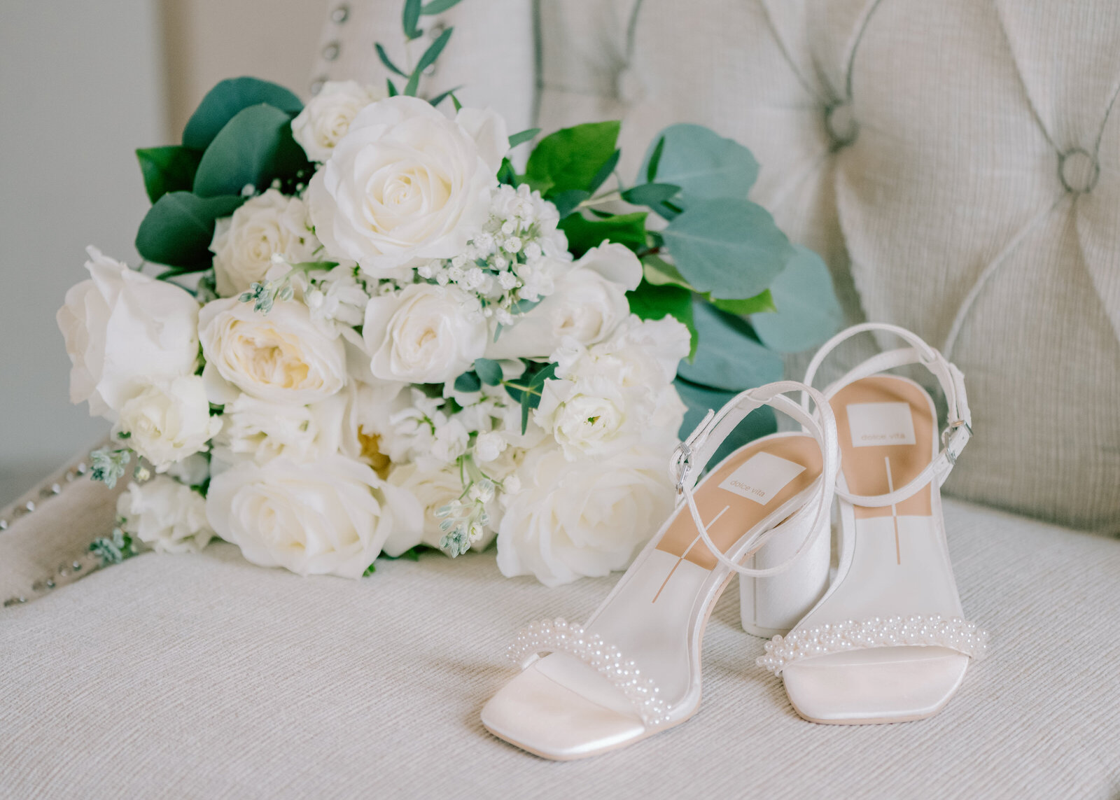 white wedding shoes and flowers at Venue3Two