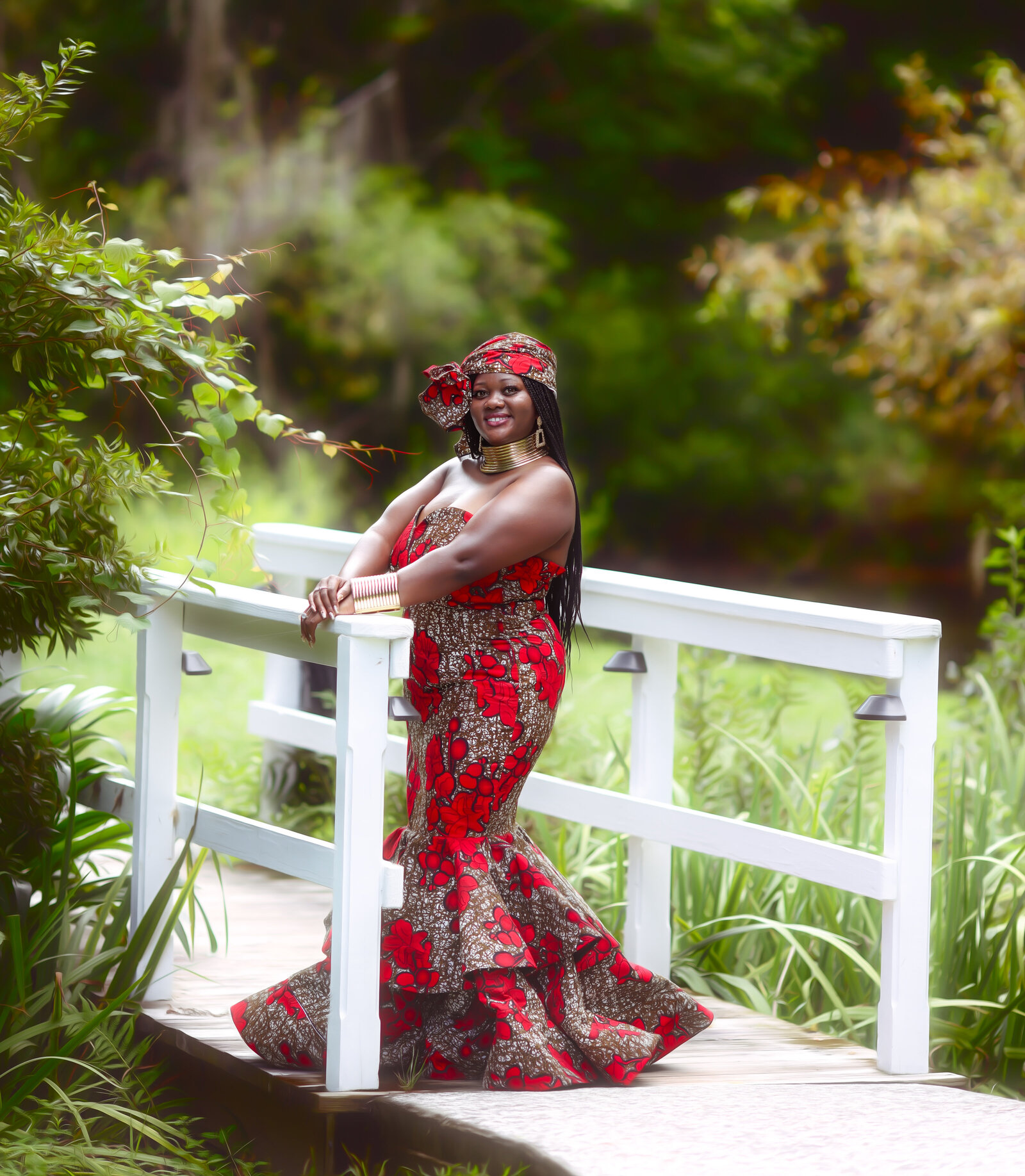 Savannah Boudoir Photography and Glamour showcases gorgeous black woman in african inspired gown in Savannah smiling