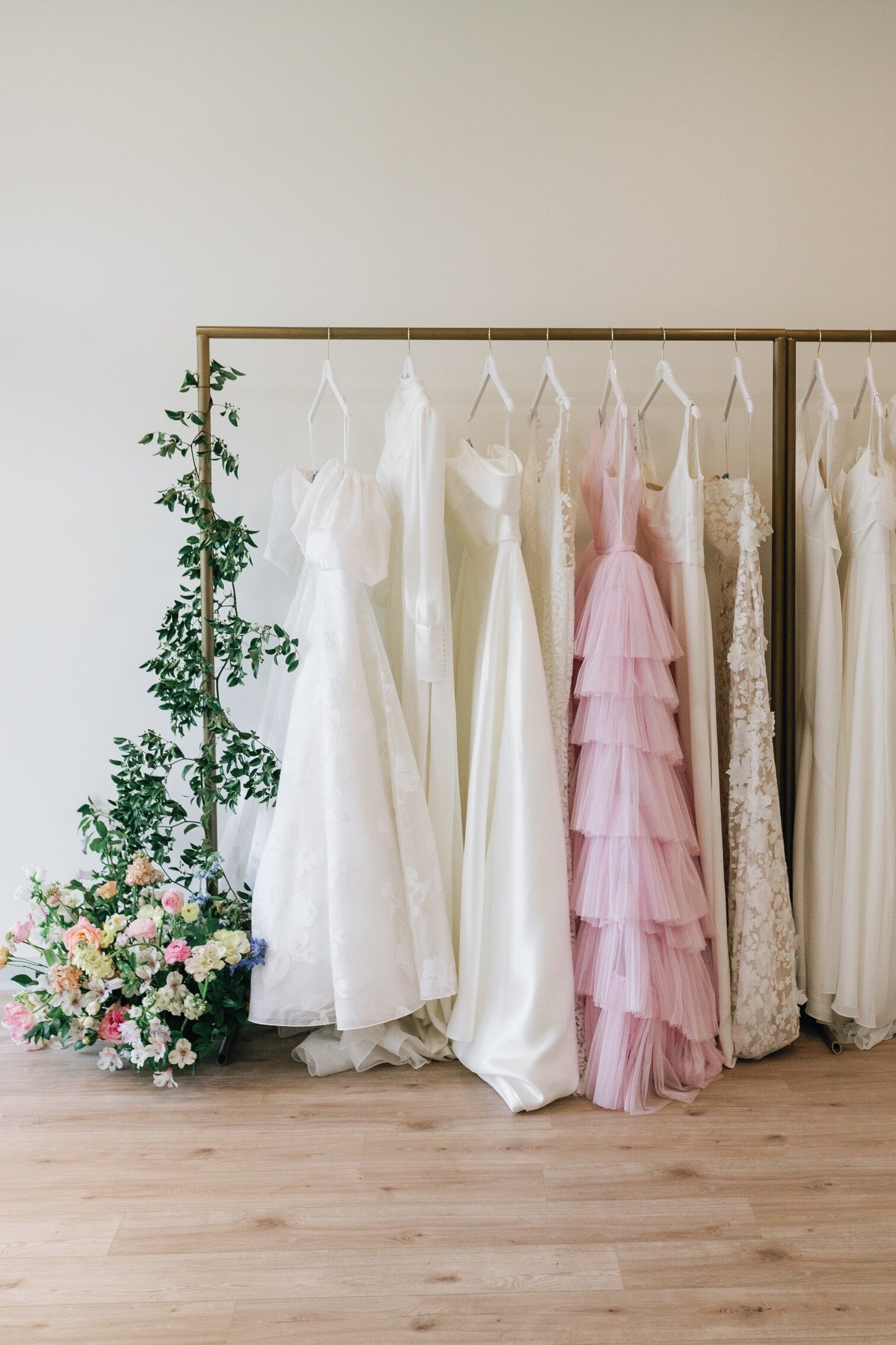 Wedding dresses on a rack at Elizabeth Cole Bridal, a bridal shop in Columbia SC.