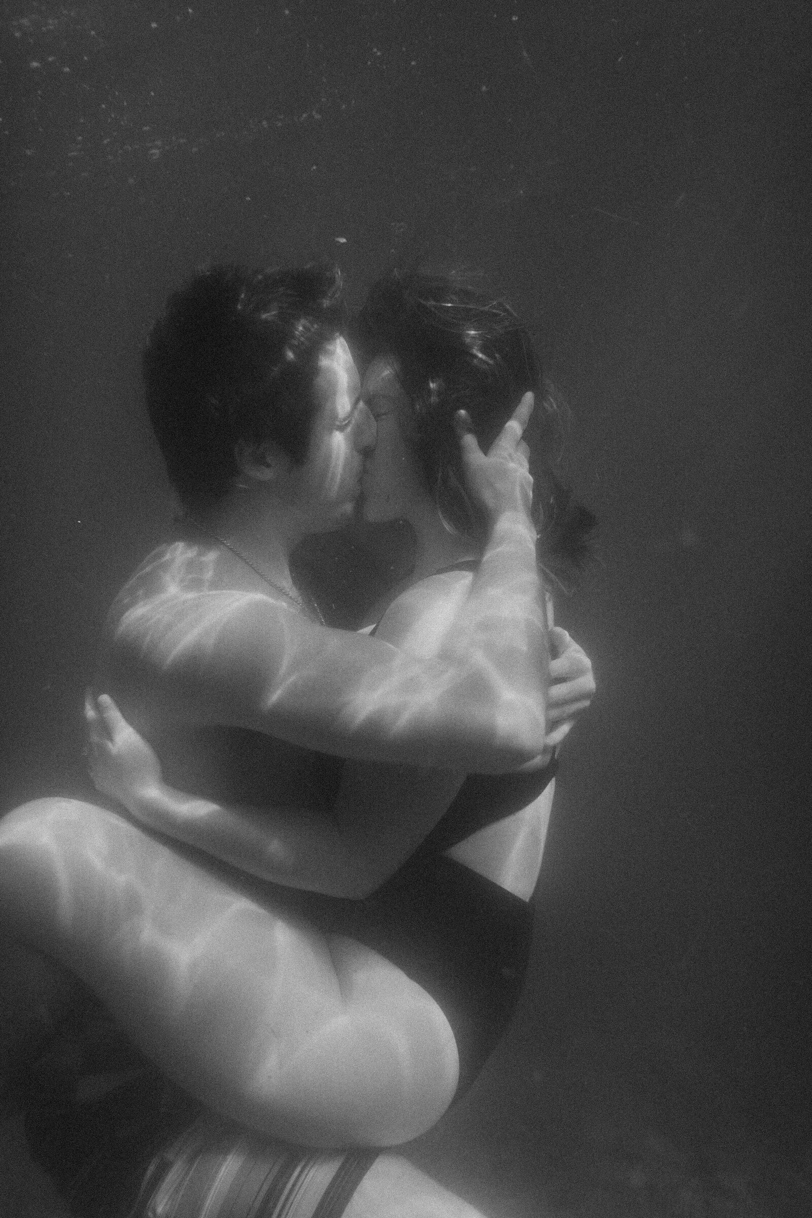 adventurous couple underwater