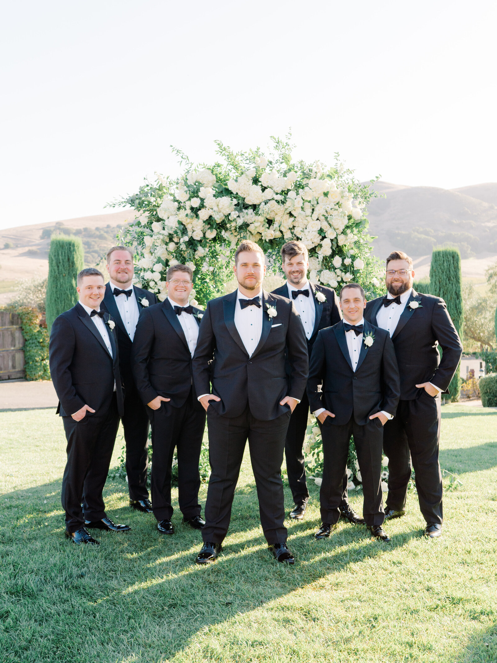 groom standing with his groomsmen