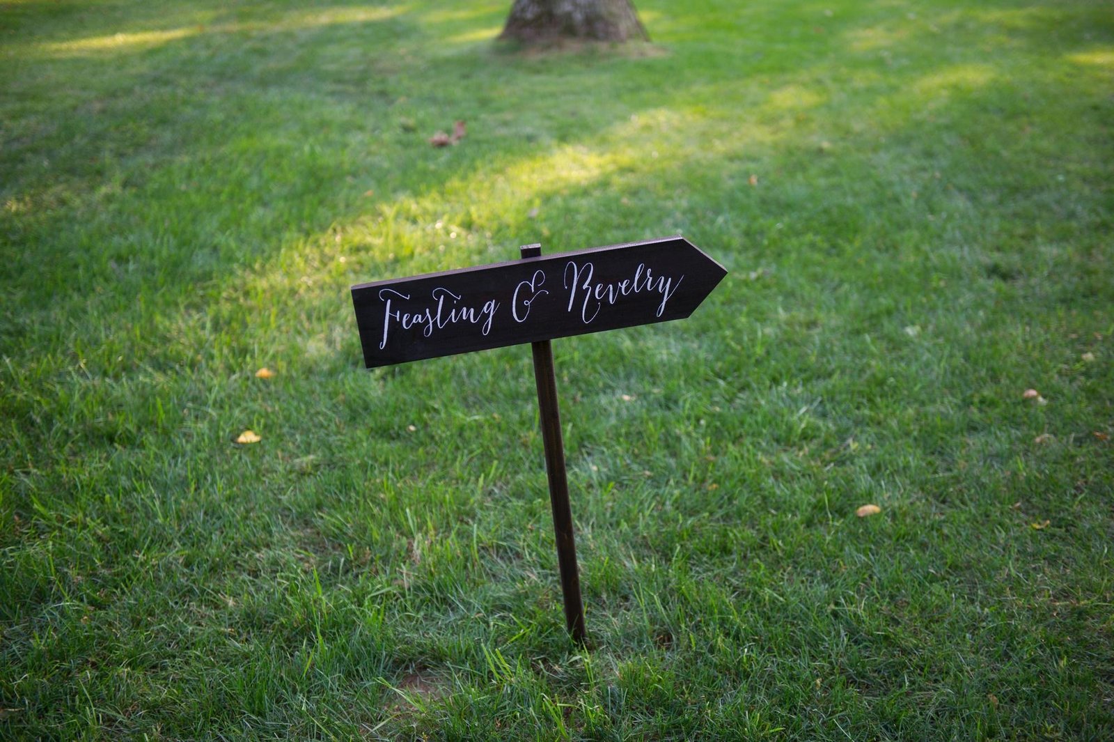 Rustic wooden wedding direction sign in Washington, CT