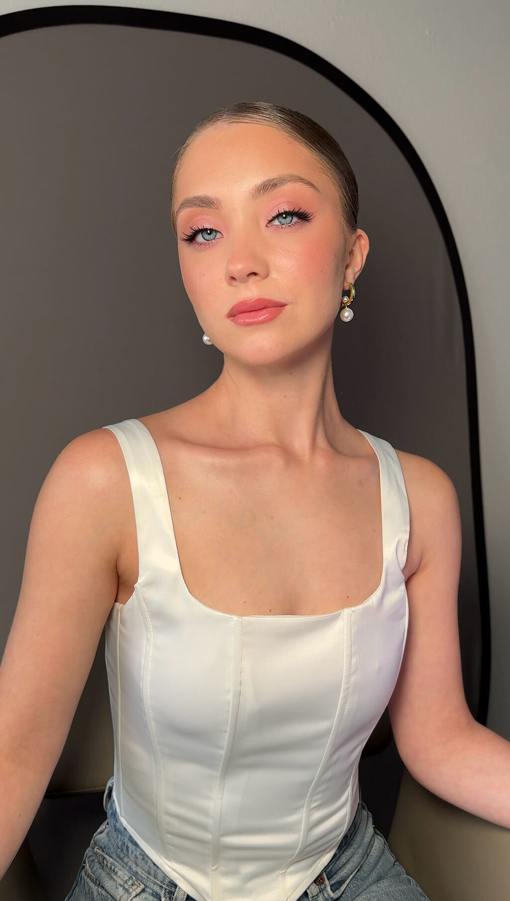 Behind the scenes: Yana styling bride’s hair and makeup before the ceremony in Marin County, California.