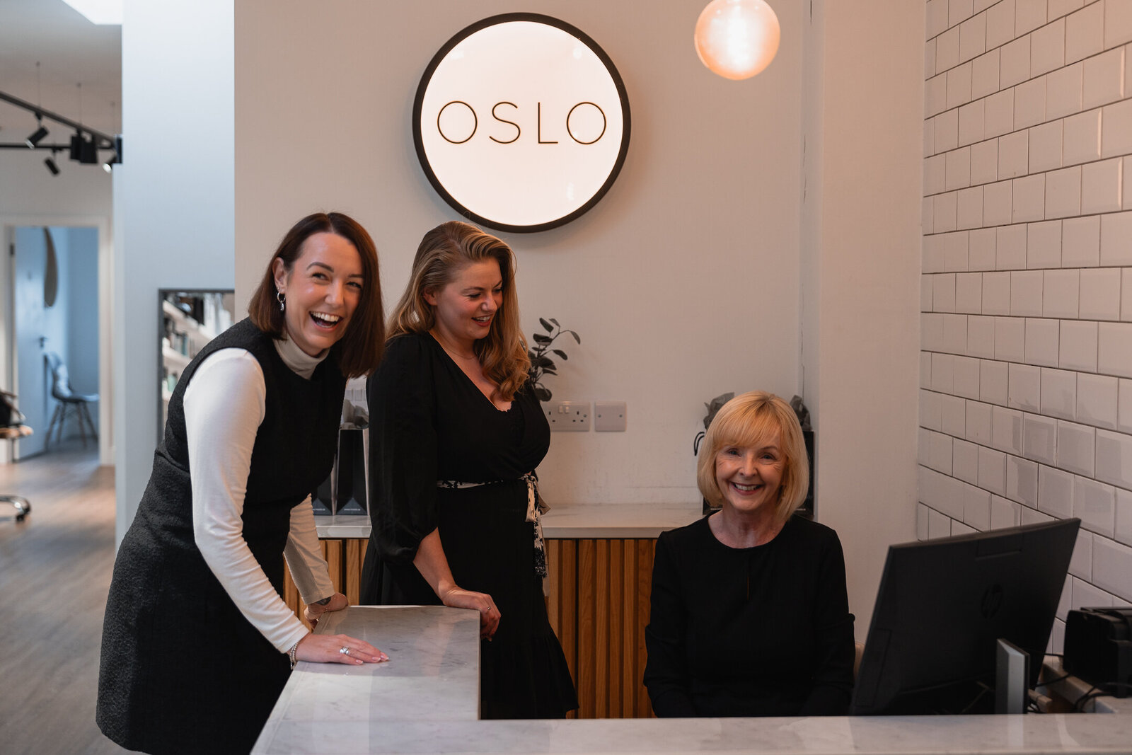 image of three women at the front desk of oslo beauty salon dublin