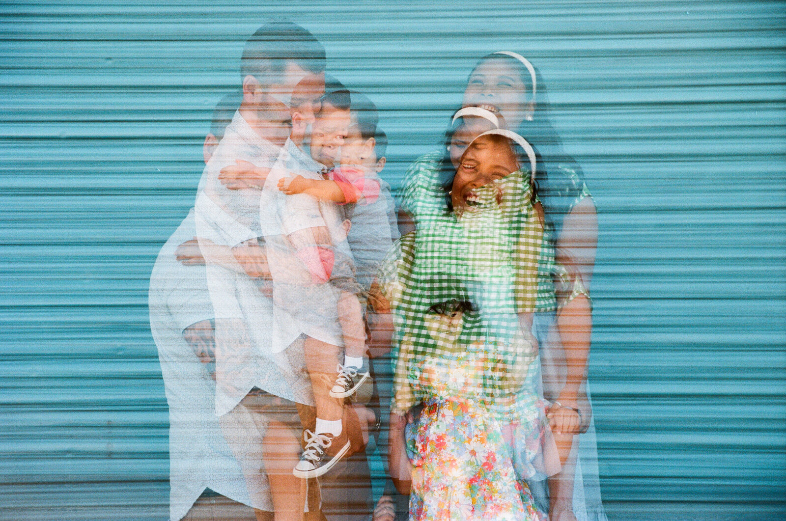 triple exposure of family of four