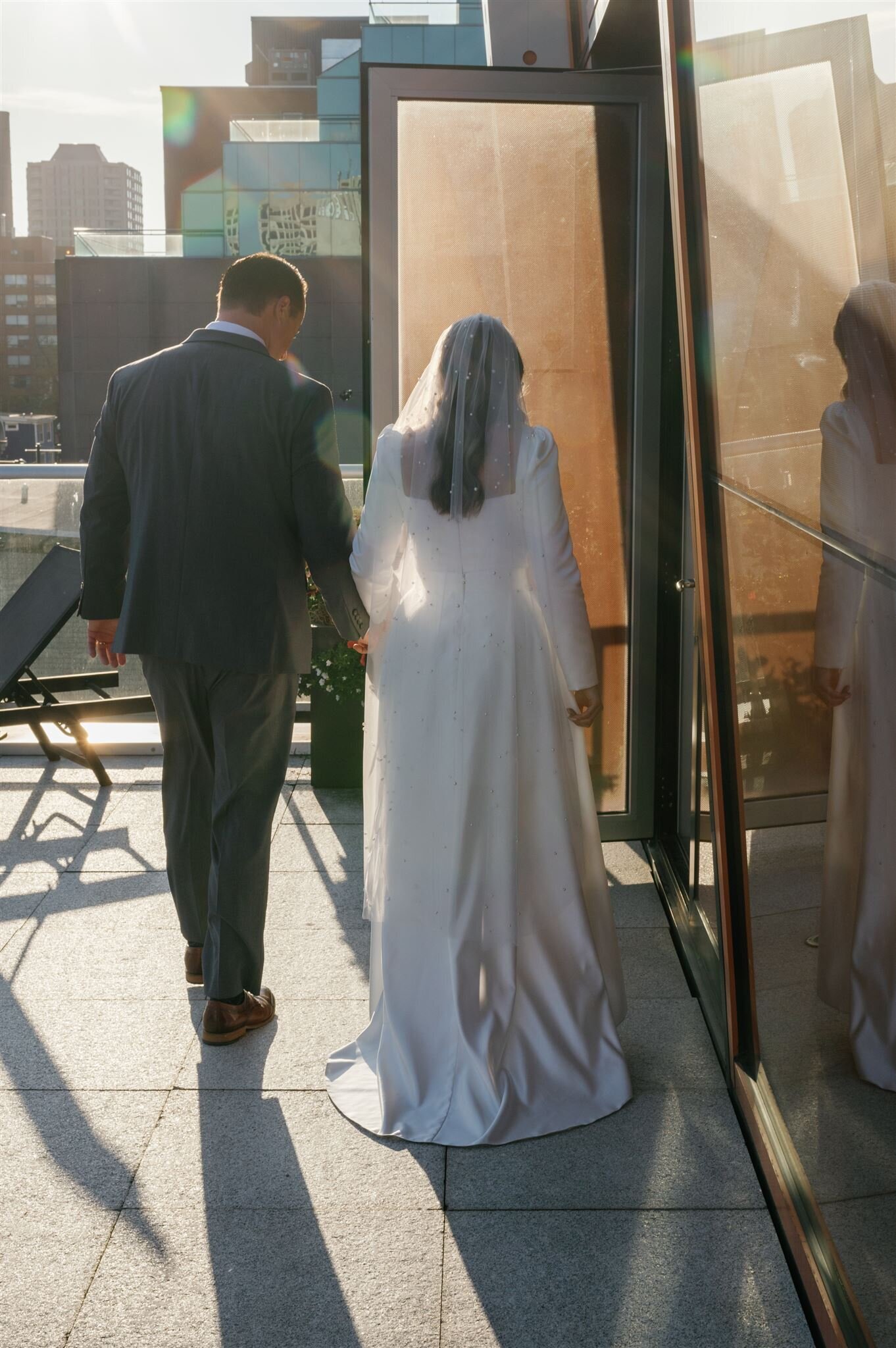 Wedding couple standing on the patio at Muir.