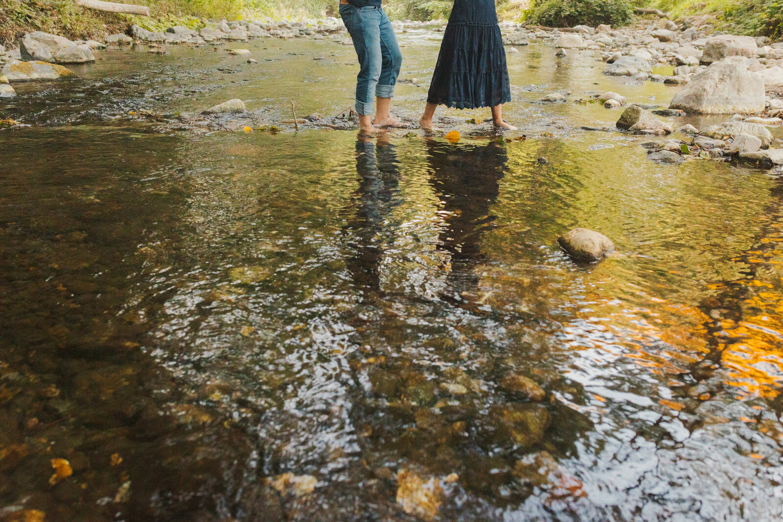A couple poses for their engagement photos in Big Sur, California.