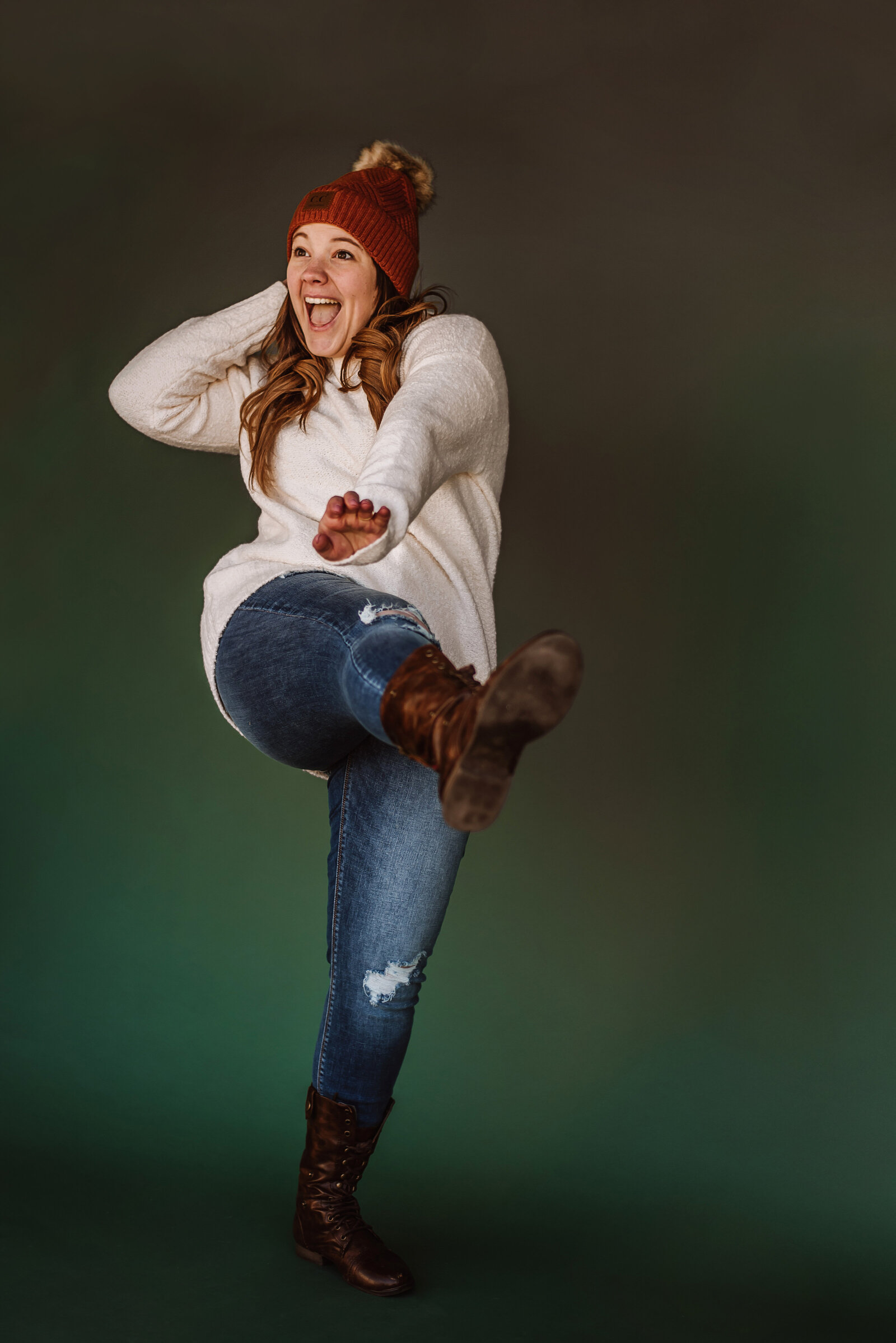 Knoxville photographer jumping in lifestyle headshot