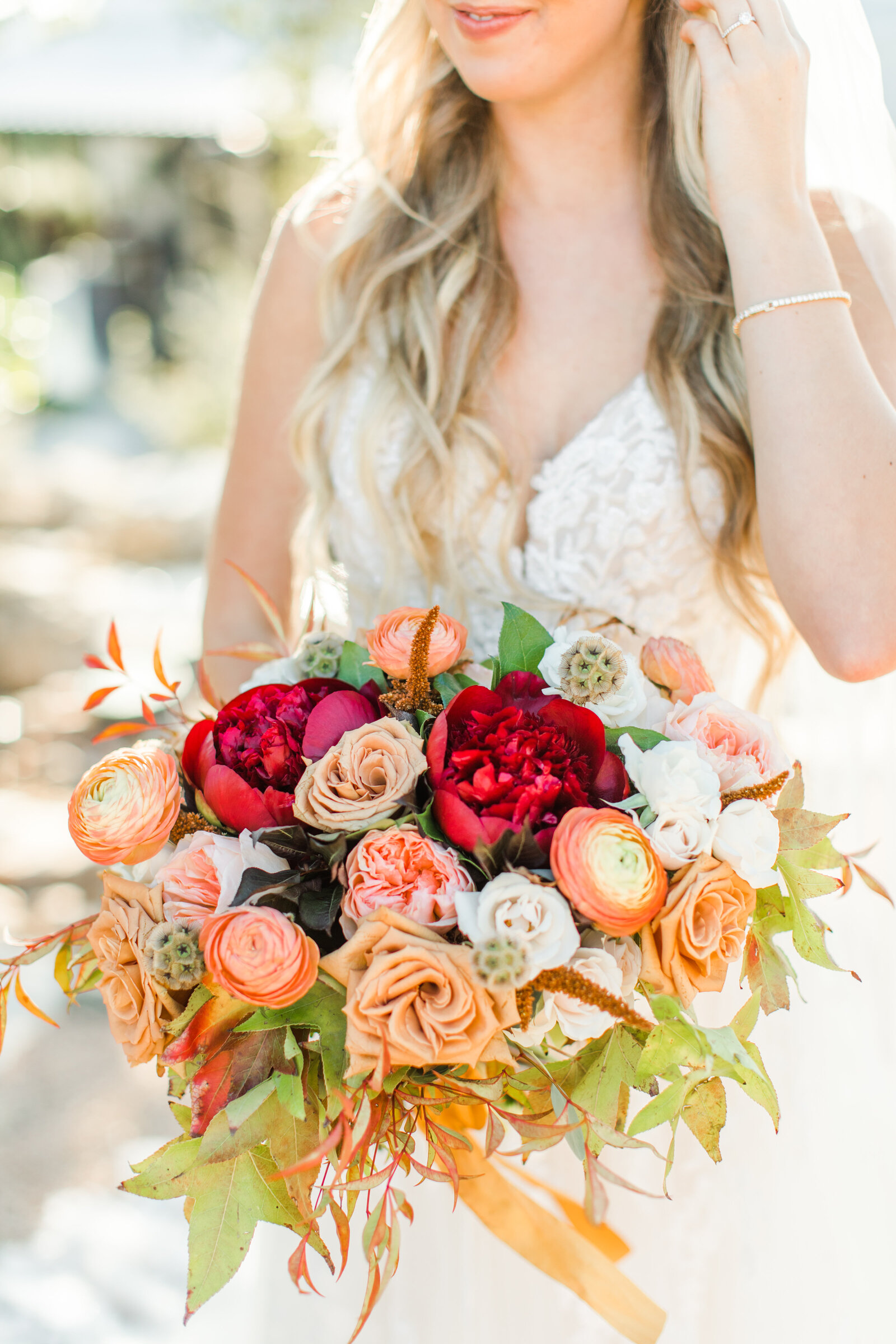 orange and red bridal bouquet