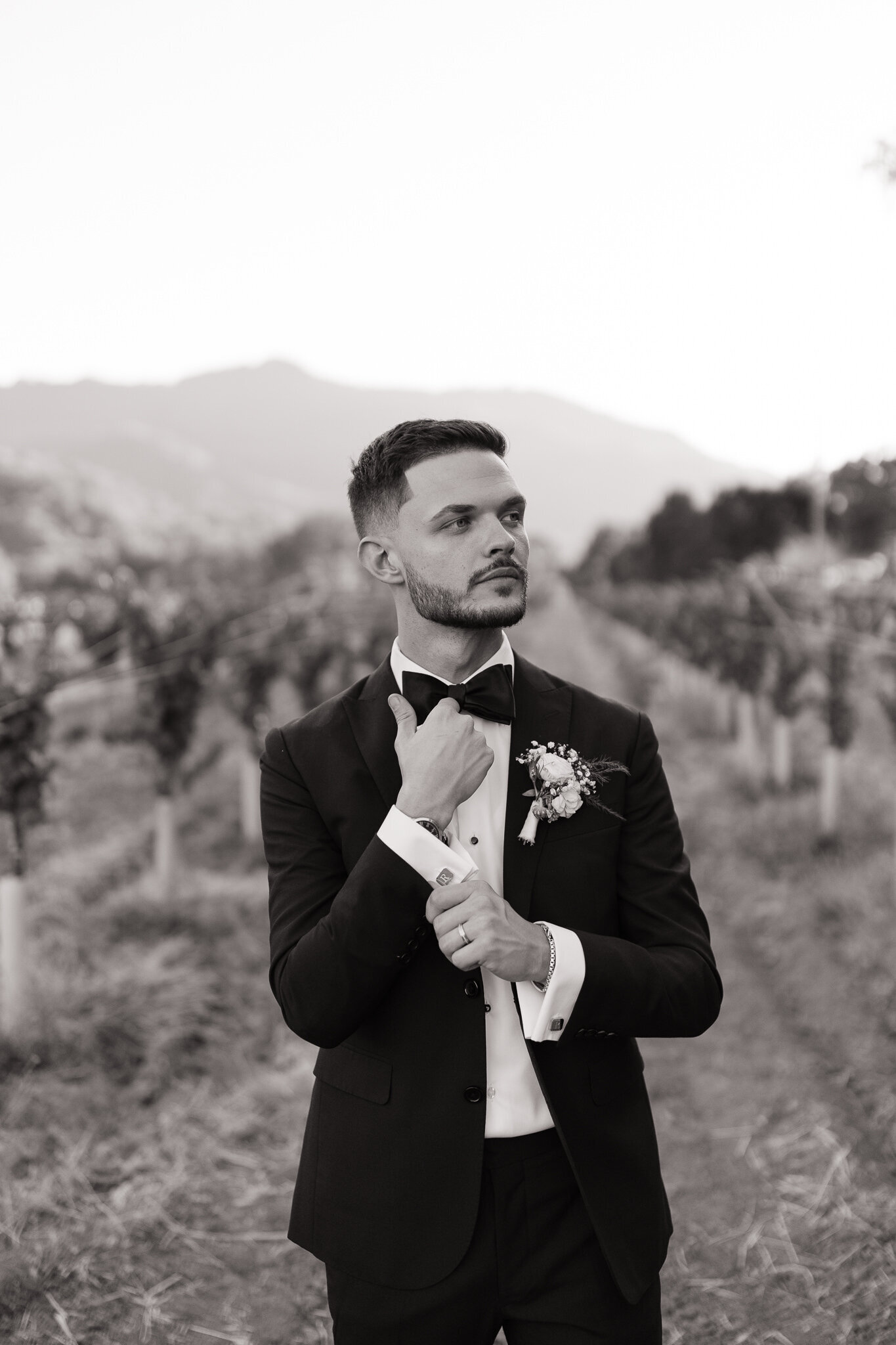 Individual groom portraits with vineyard backdrop at Nelson Family Vineyards in Ukiah, CA