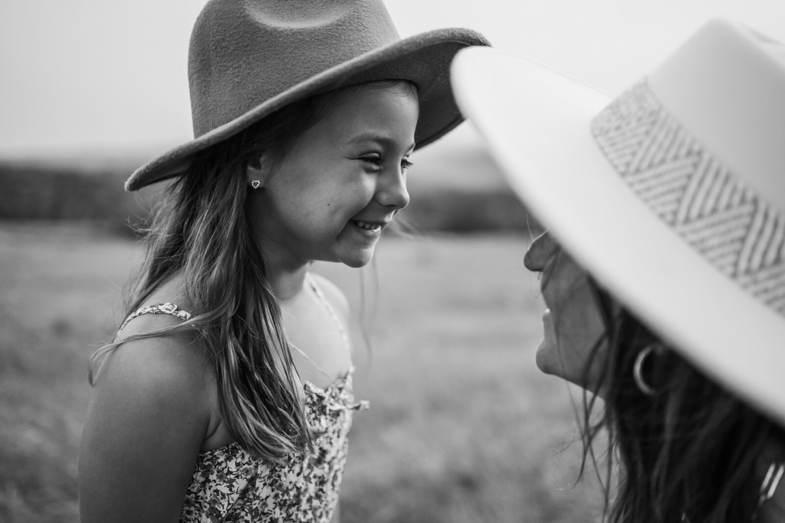Girl smiling at her mom for family photos