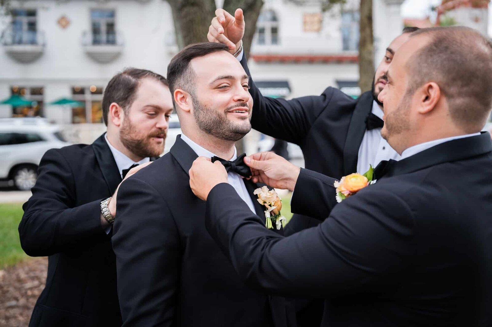 groom and groomsmen candid photos at jewish wedding at Casa Monica in St Augustine wedding Venue