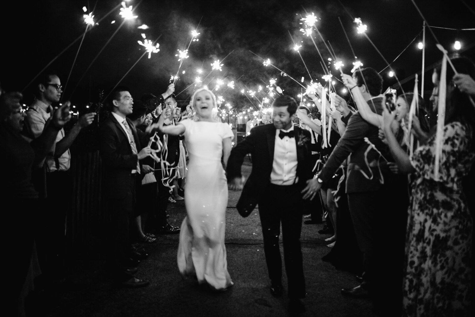 Black and white film style sparkler exit at Juniper Green wedding venue