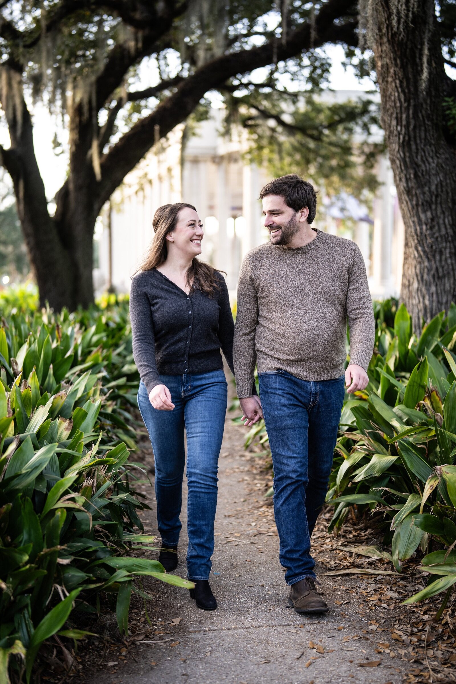 Couple walking on path in City Park with Peristyle in the background