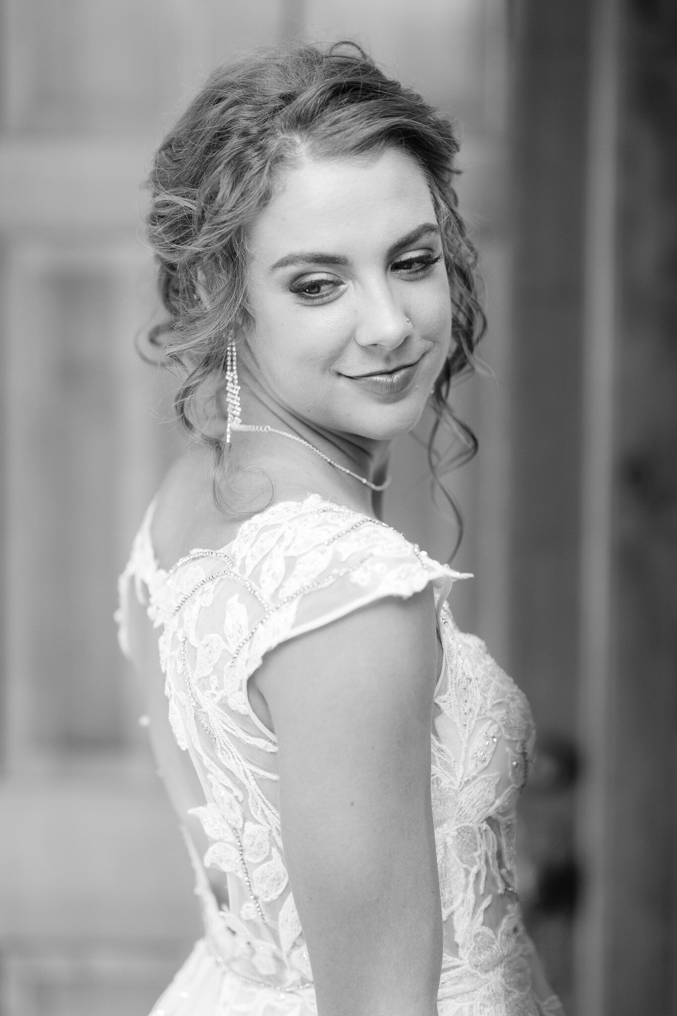 black and white close up, curled hair on bride