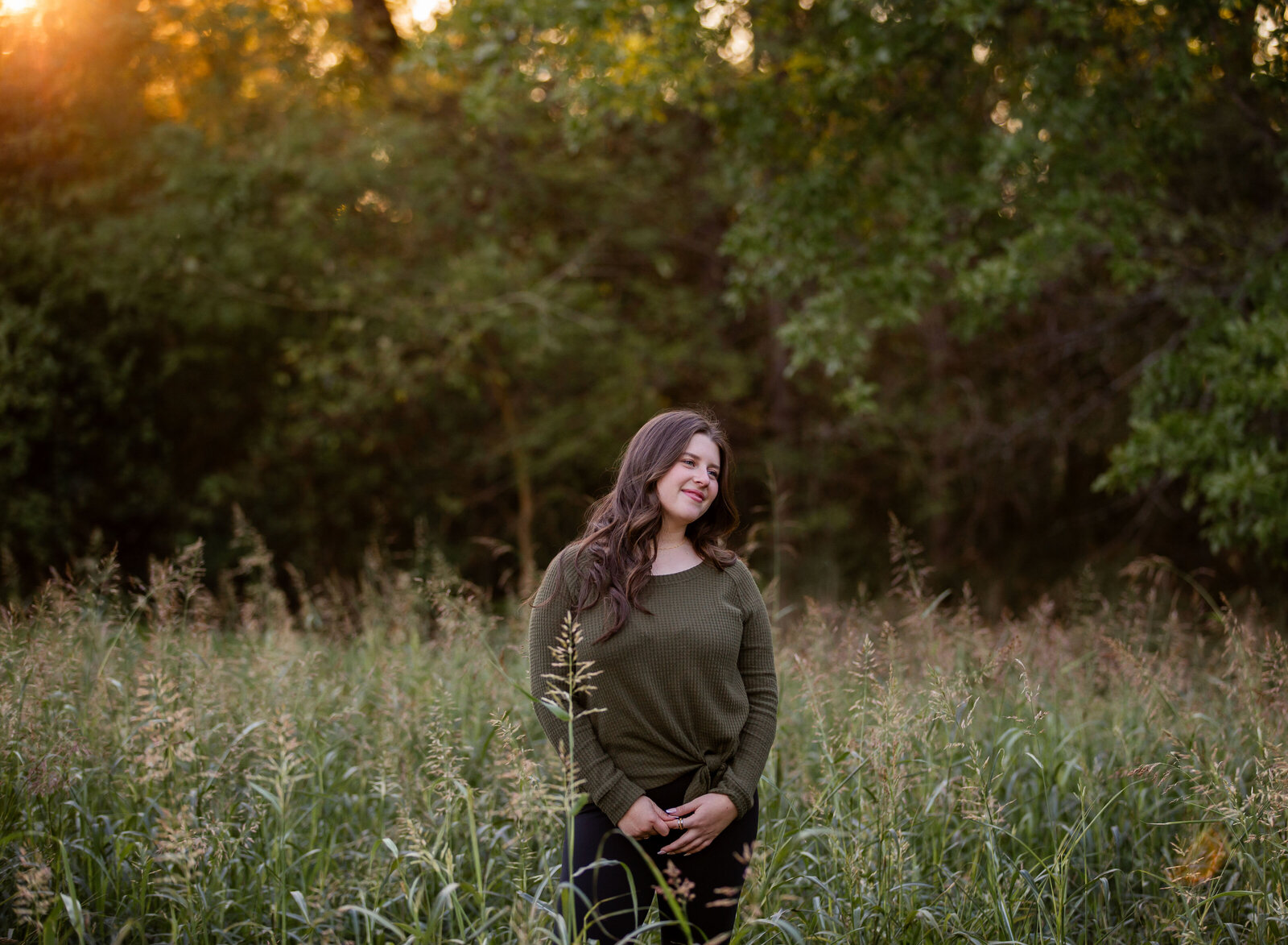 senior girl in tall grassy field