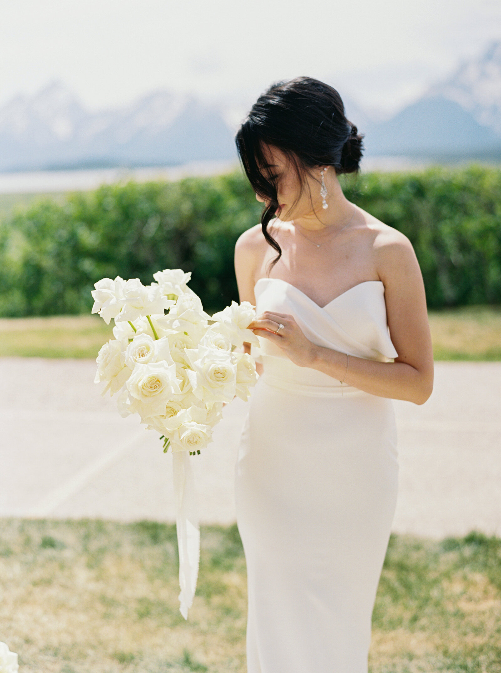 Bride with her all white bouquet