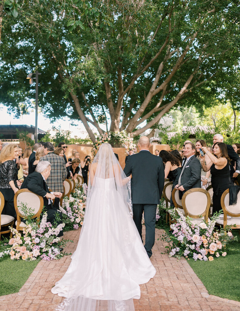royal-palms-winter-wedding-ceremony-aisle-flowers