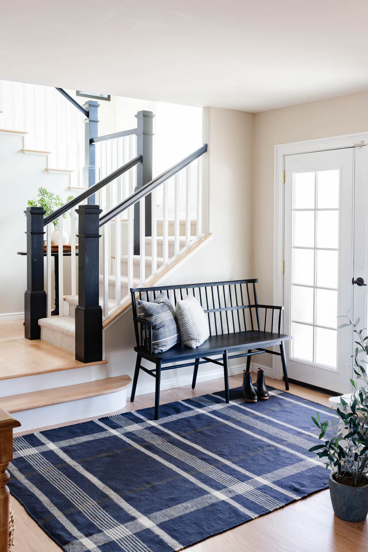 Modern Farmhouse Charming Cottage Warm White and Black Staircase Stairway Entryway by Peggy Haddad Interiors44