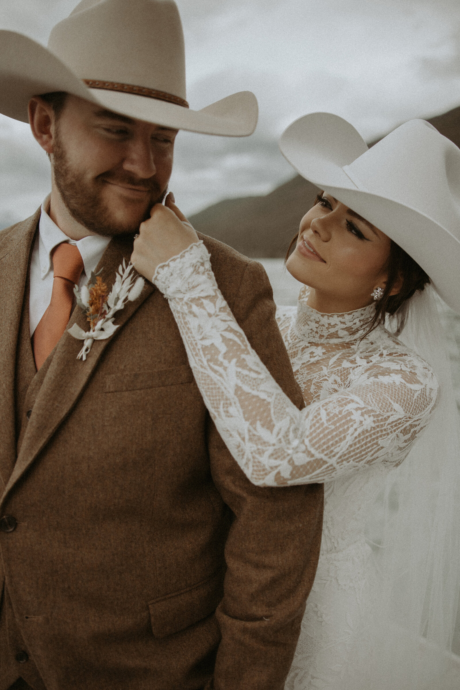 couple standing with each other during outdoor elopement in glacier national park