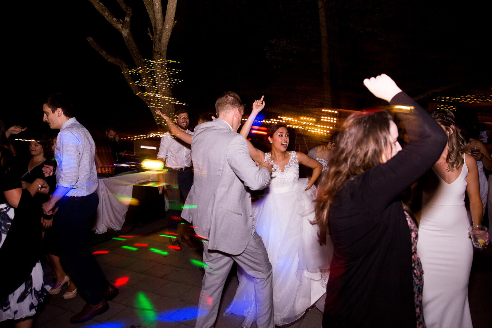 Bride and groom dancing during wedding reception.