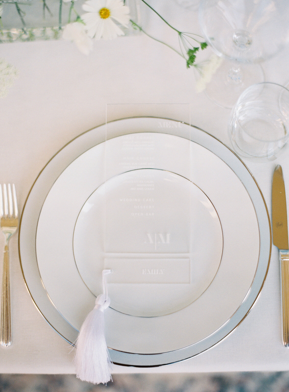 Place setting at reception table. Monogrammed menu and name card with tassel. Photographed by Amy Mulder Photography.